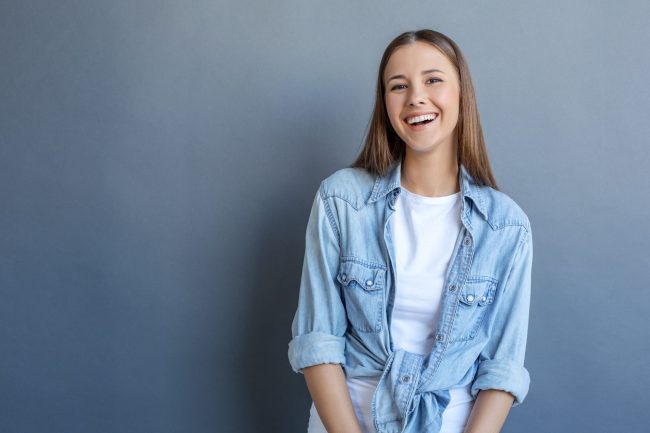 Young,Woman,Free,Style,Isolated,On,Grey restorative dentistry brentwood
