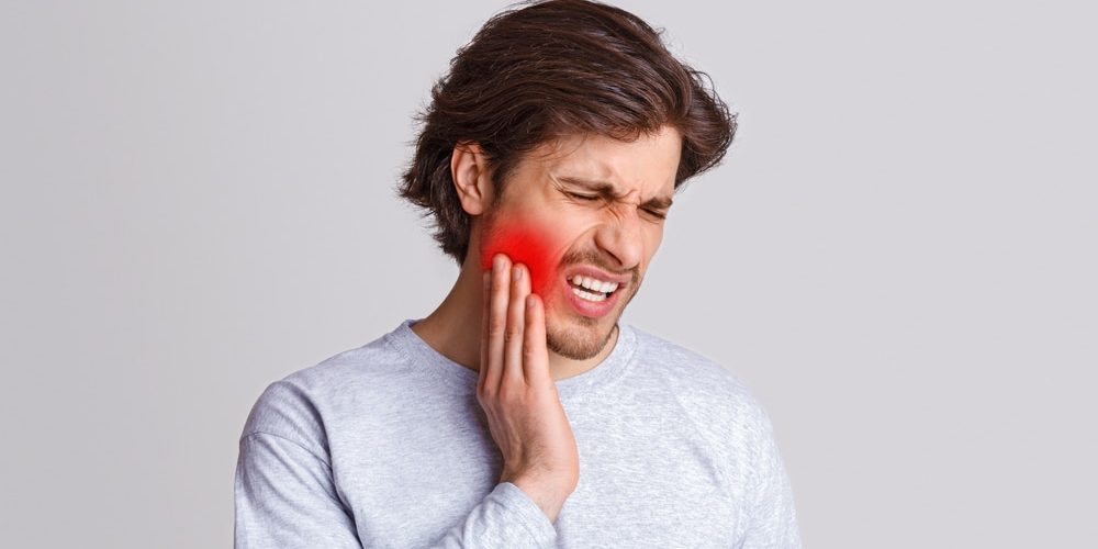 Endure,Pain.,Sad,Man,Suffers,From,Pain,In,His,Teeth emergency dentist near me