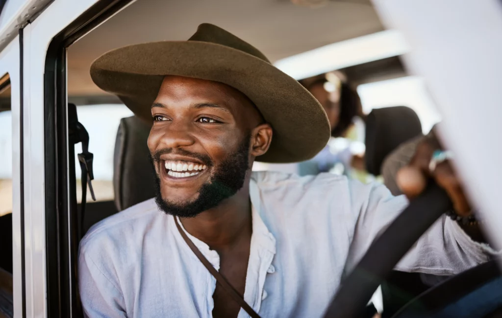Smiling man enjoying confident smile after cosmetic dentistry at Ackerman & Towson Dentistry